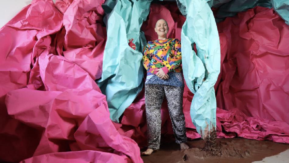 Disabled sculptor and Drag King Lady Kitt in colourful clothing