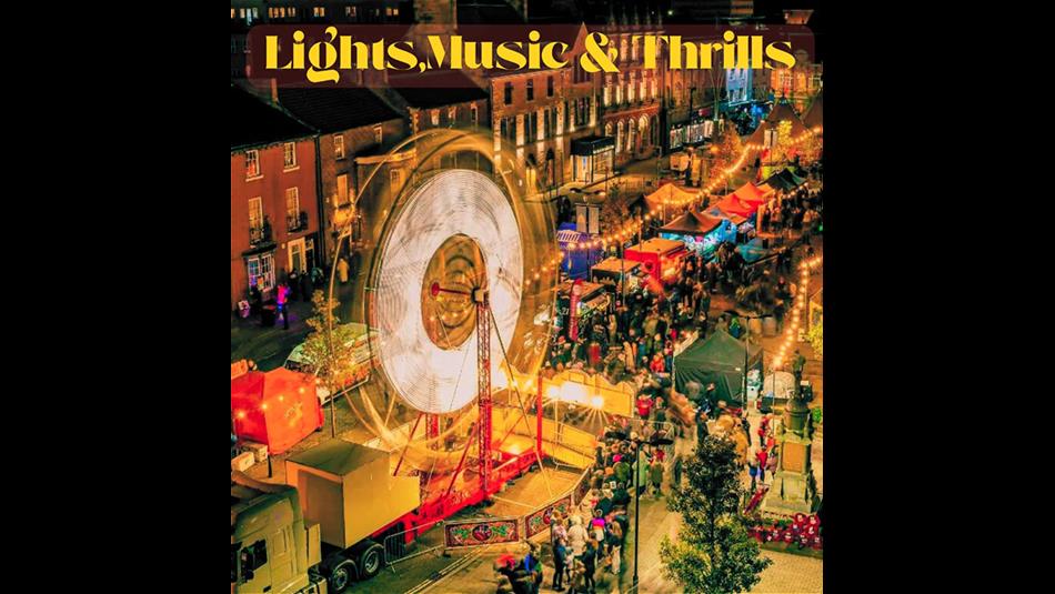 A carnival along a street with a Ferris Wheel, colourful stalls and bustling crowds.