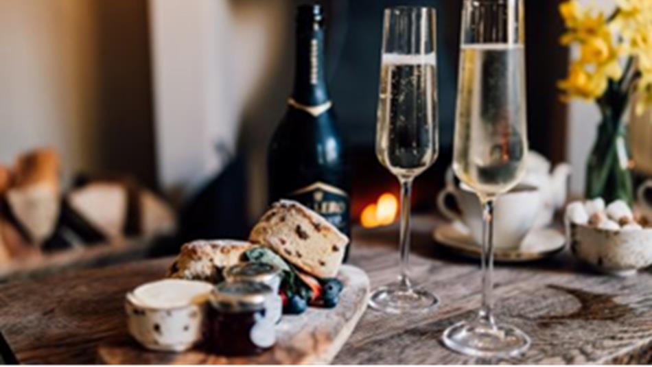 Wine and a selection of scones and jams.