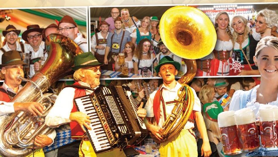 Poster showing 'The Amazing Bavarian Stompers Show'. Musicians, a Bavarian woman with beer and people smiling.