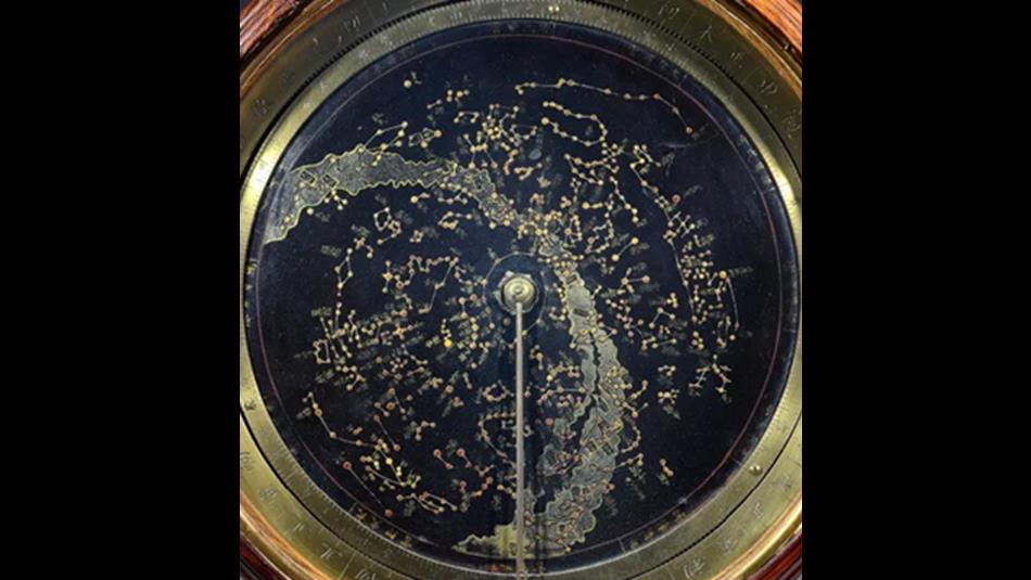 A close up photograph of a Chinese astronomical clock face.