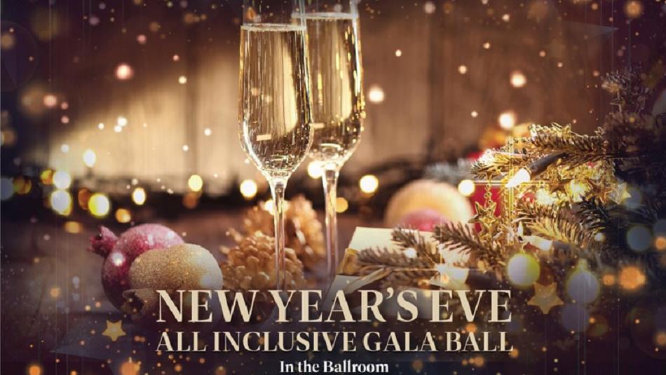 Champagne flutes, twinkly fairy lights and festive table decorations for the New Year's Eve All Inclusive Ball