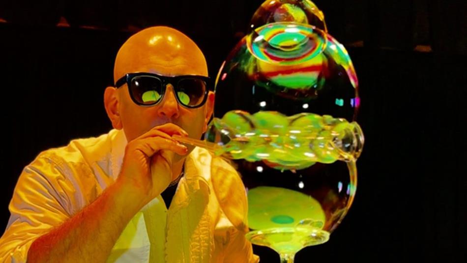 Ray Bubbles blowing colourful, large bubbles.