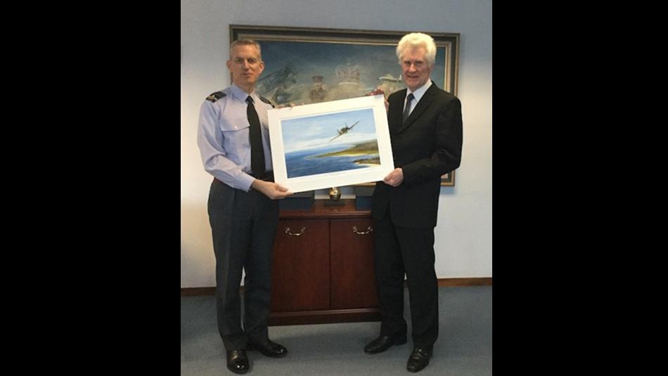 Denis Harry Fox with one of his Battle of Britain illustrations.