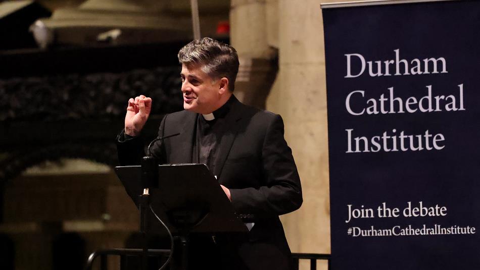 Vicar delivering a talk at Durham Cathedral