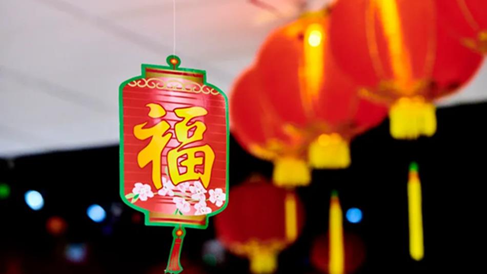 Red lanterns decorations with Chinese characters hanging from the museum ceiling.