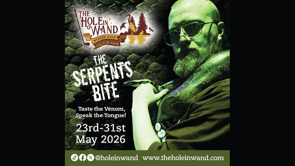 Serpent's Bite - The Hole in Wand Wizard Golf Dalton Park. Person illuminated in green lighting holding a snake.