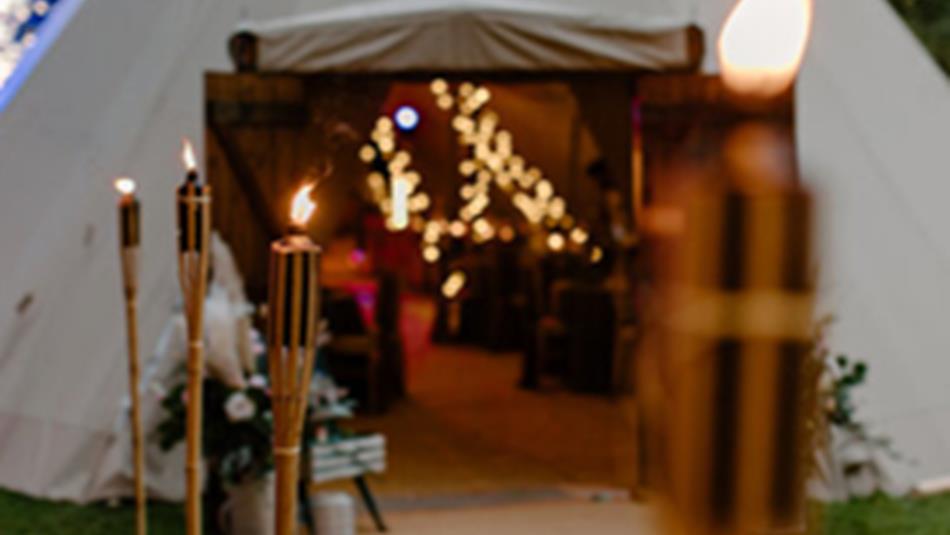 Lumley Castle Tipi softly lit with candles and fairylights
