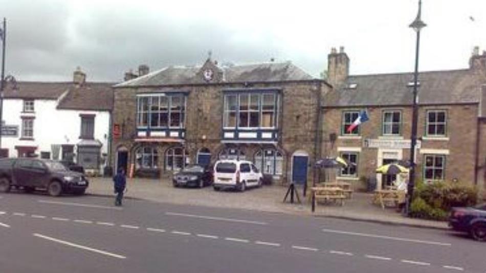 The outside view of historic stone building in the village