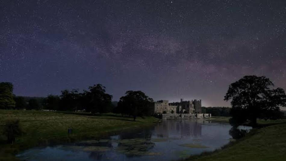 Landscape view of Raby Castle with the open starry sky