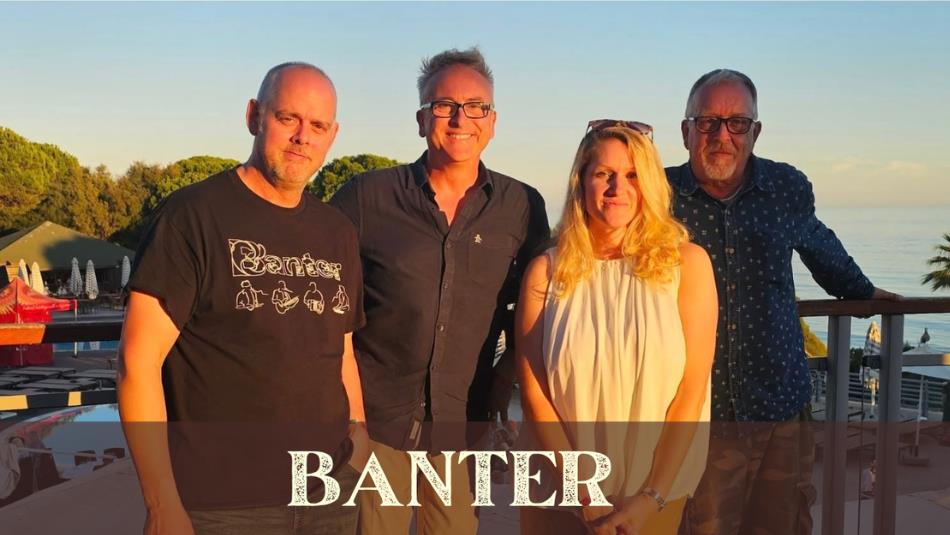 Four people standing on a balcony over the water, with the text 'Banter' underneath them