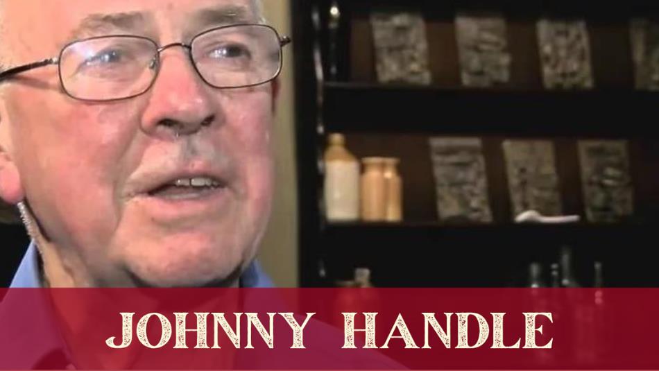 A close up of a person wearing glasses, Johnny Handle.