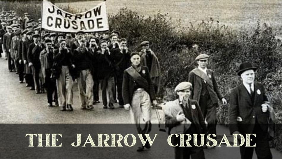 Historical photo of the Jarrow Crusade, a group of people walking down the road with a large banner.