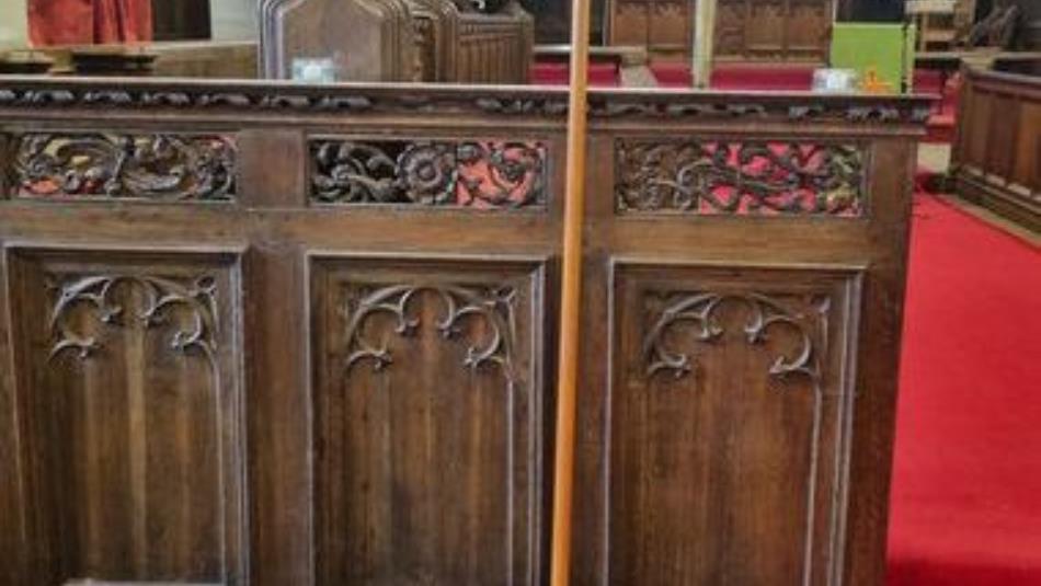 Ornate floral wood carvings in a church.