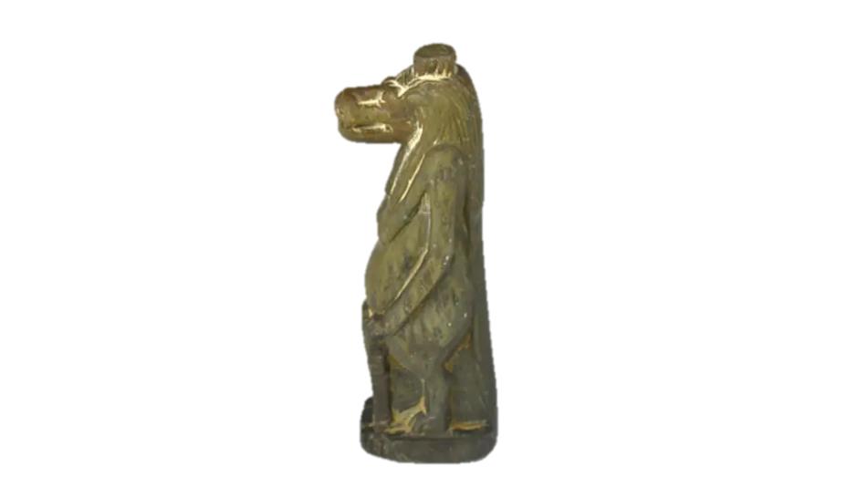 A statue of Taweret, an Egyptian god in the shape of a combination of a hippopotamus, lion and crocodile.