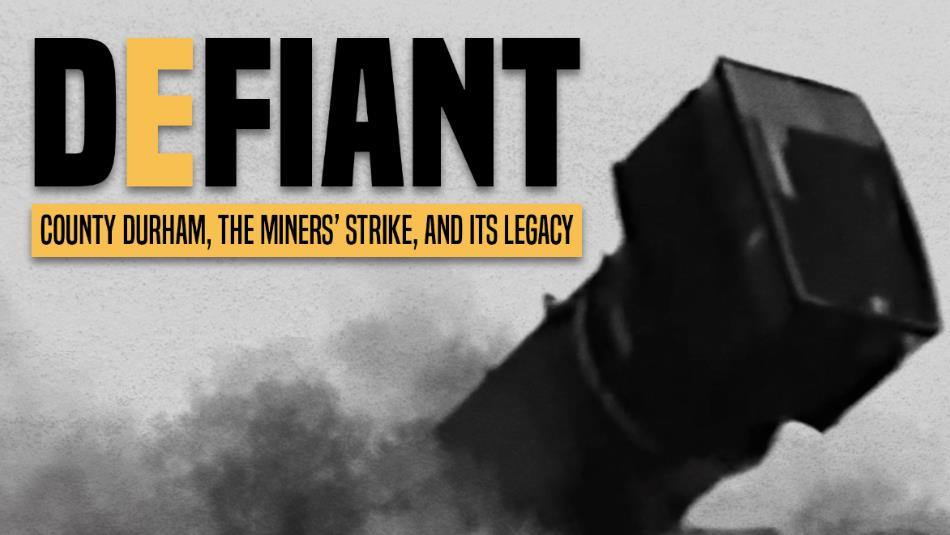 A black and white image of a colliery being demolished, with the bold text which reads 'Defiant' in black and yellow font.