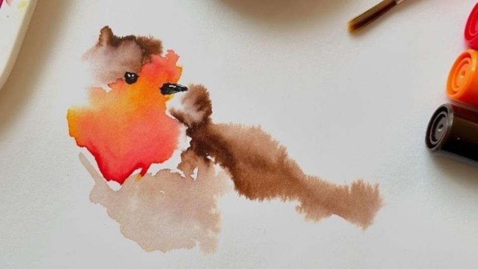 An abstract watercolour of a Robin bird on a piece of white paper.