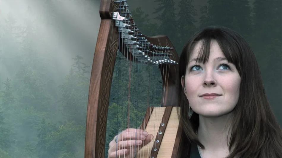 Person playing the harp looking wistfully off to the right, shrouded in a mysterious fog with a forest-like background