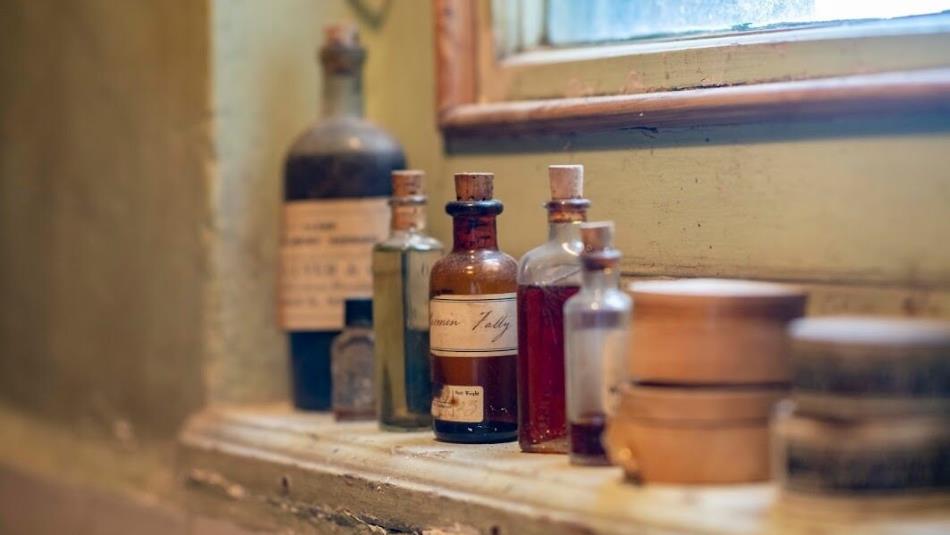 A shelf of bottles and potions