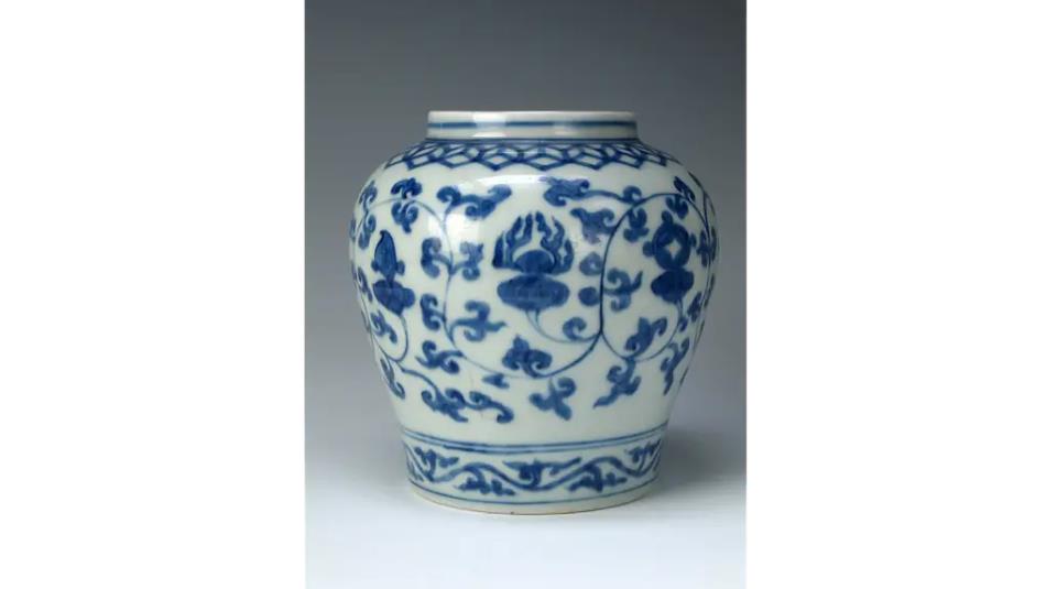A porcelain pot with intricate blue floral pattern