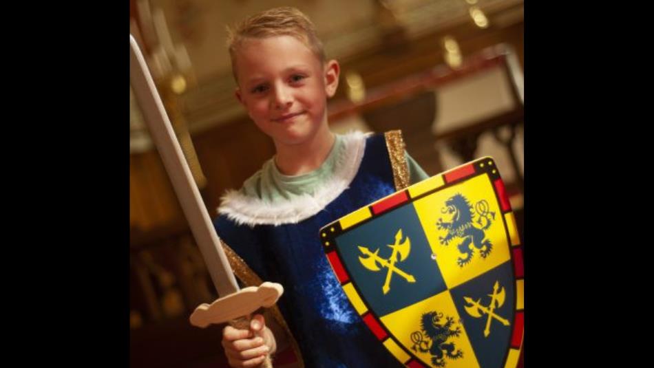 Child with sword and shield at Raby Castle.