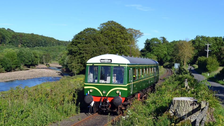 Weardale Railway Class 122 'bubble car', travelling through the Durham countryside.