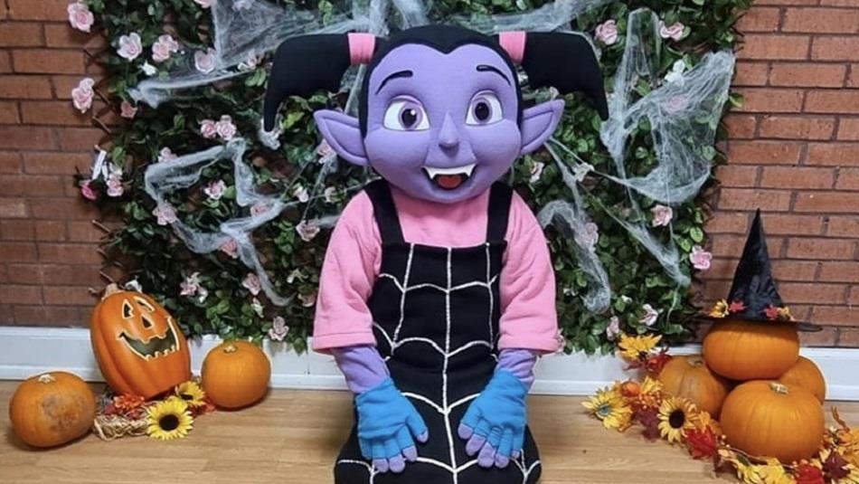 Vampirina character surrounded by pumpkins