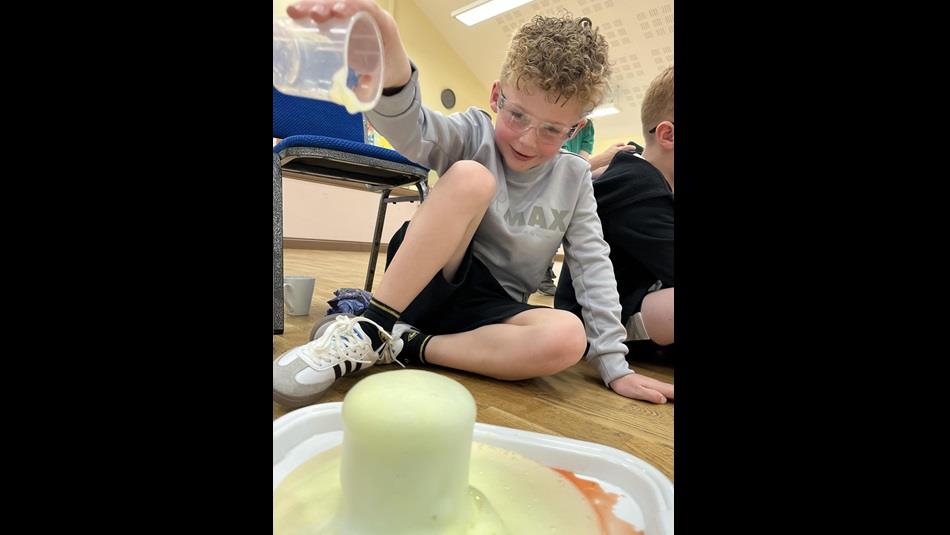 Child performing a science experiment