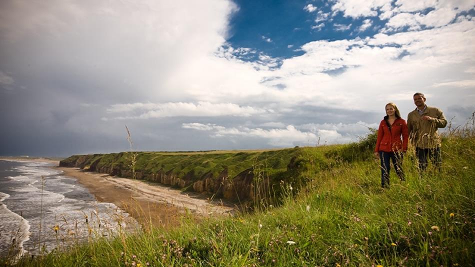 couple walking on the Durham Heritage Coast