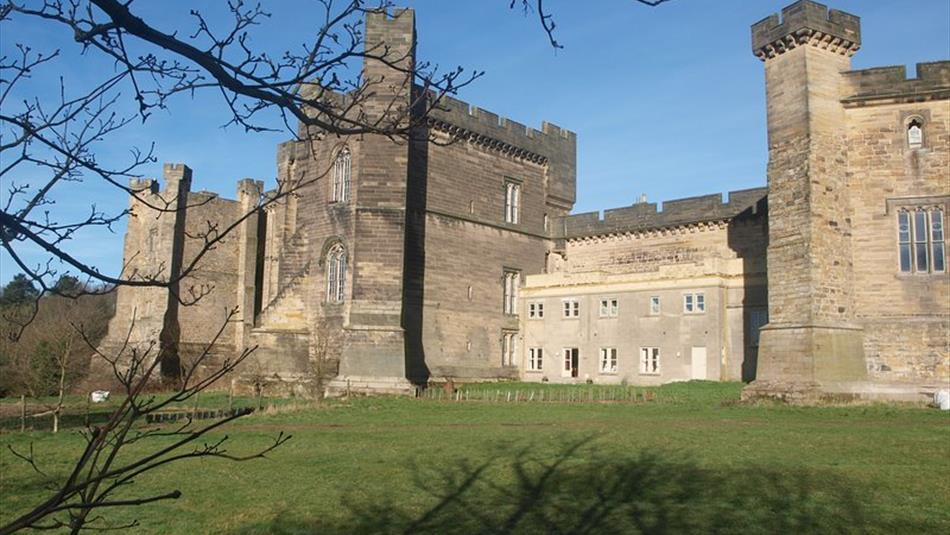 Exterior view of the walls and towers of Brancepeth castle