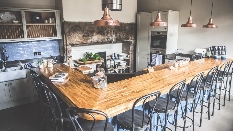 kitchen at the Lord Crewe Arms with seating around countertop.