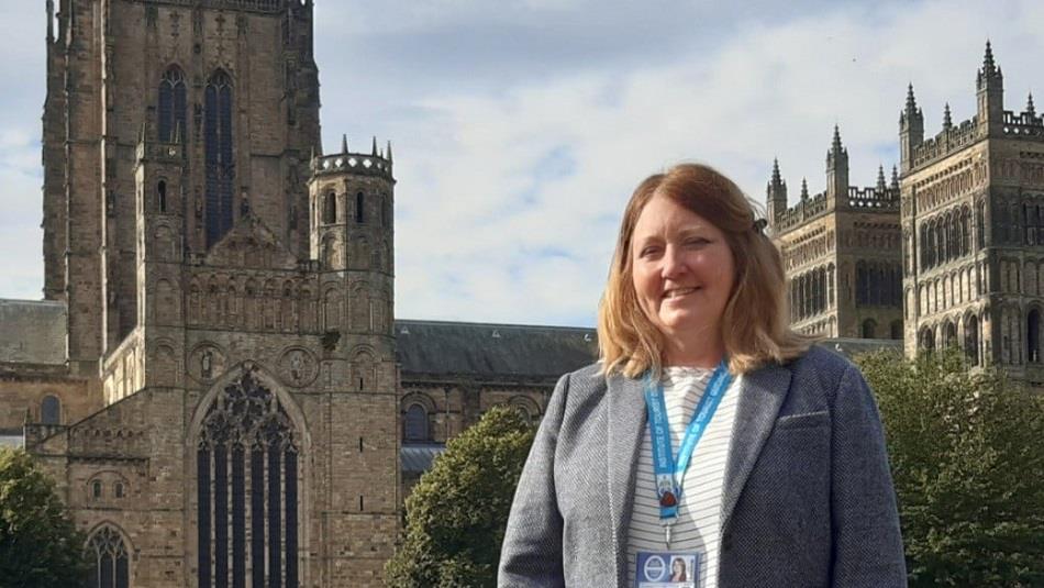 Laura Rhodes in front of Durham Cathedral