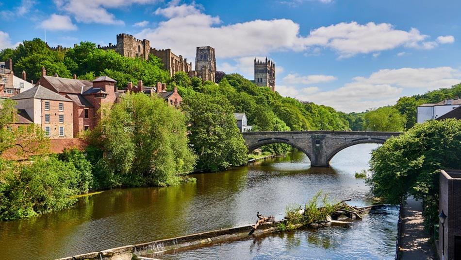 The River Wear in Durham City, Framwellgate Bridge and Durham Castle and Cathedral in the distance.