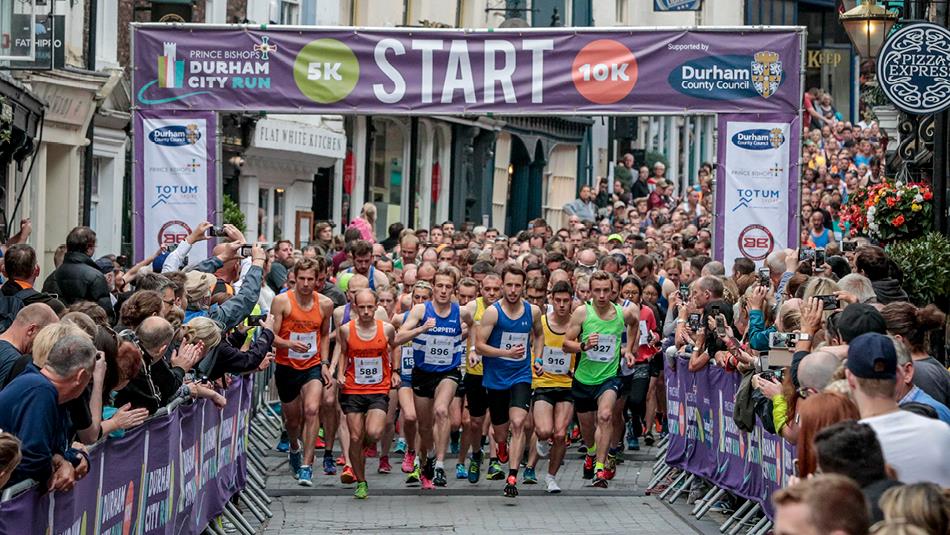 runners set off rom the start line of Durham City Run