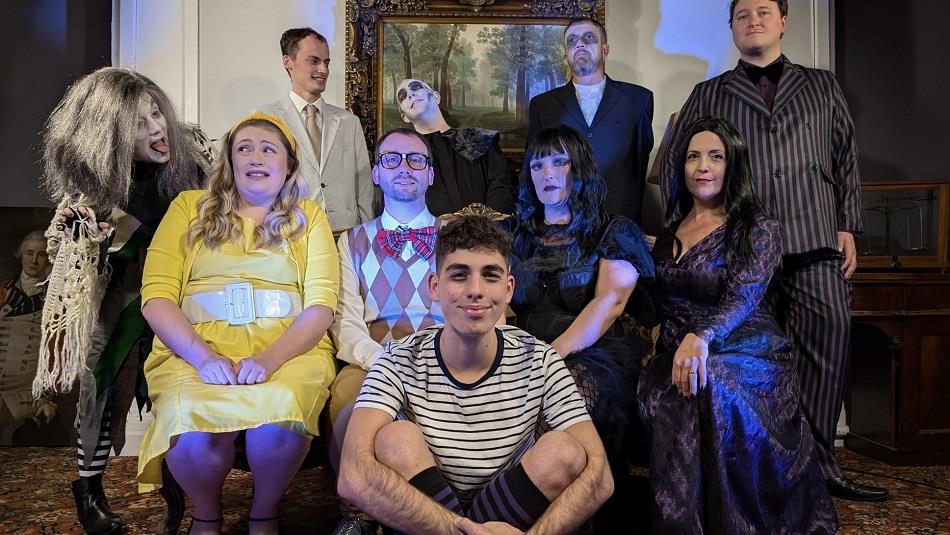 Actors dressed a Addams Family characters