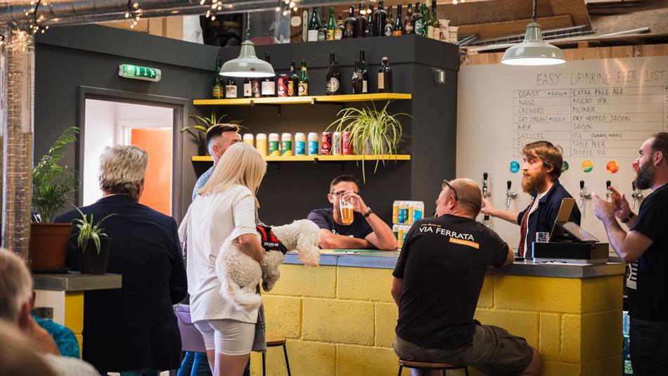 People drinking at the bar