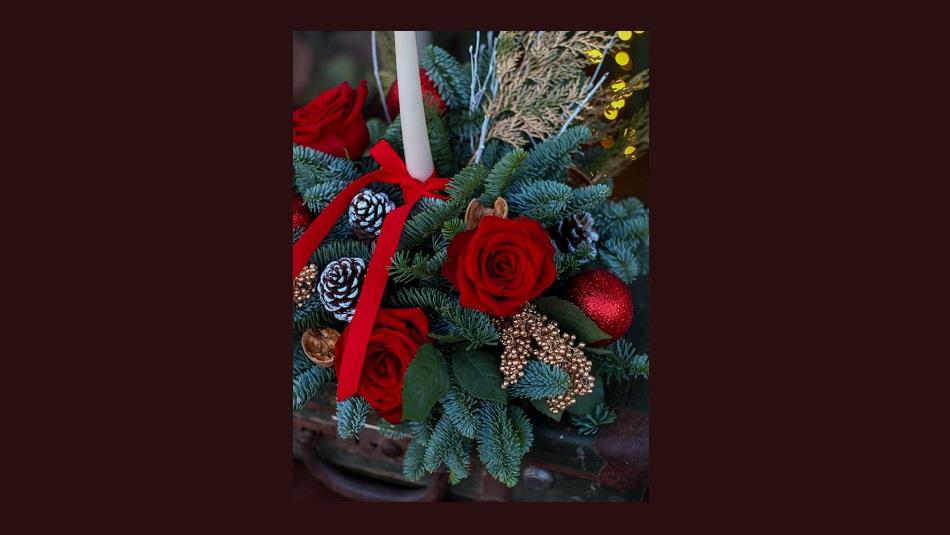 Christmas themed flower display in greens and reds