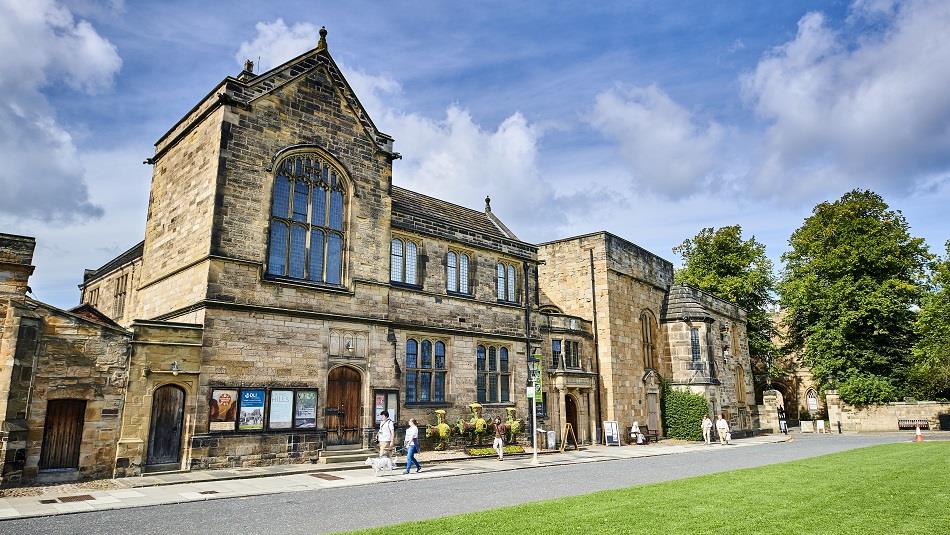 Image of Palace Green Library's exterior on a sunny day.