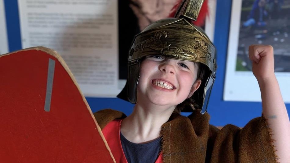 A child dressed as a Roman