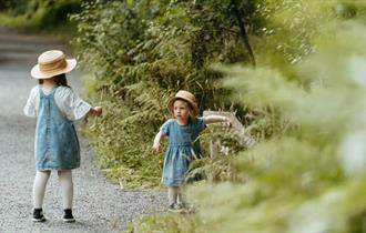 Two children walking the trail