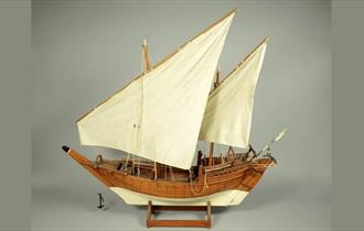 A model of a boat at The Oriental Museum