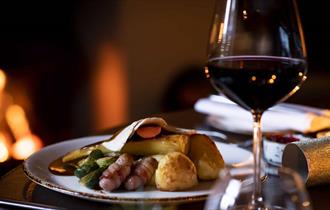 Festive lunch with glass of red wine
