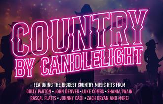 Silhouette of Country singers performing on a hazy stage. 'Country by Candlelight'