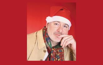 image of Guy Masterson wearing Christmas hat