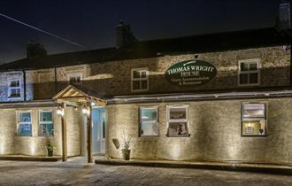 Thomas Wright House external image at night