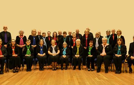 The Argus Singers, front row seated, the back row standing
