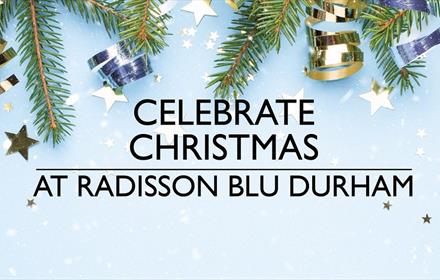 Christmas at Radisson Blu Hotel, image of stars, Christmas decorations and fir tree branches.