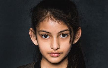 Image of a girl aged between 10 and 12 years old.