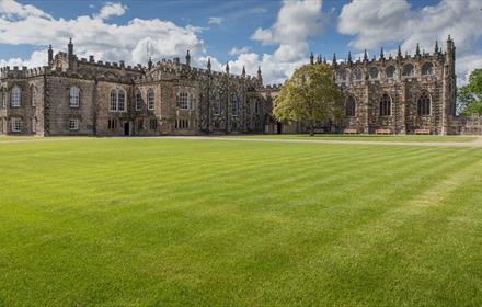 Auckland Palace exterior with lawn area to foreground