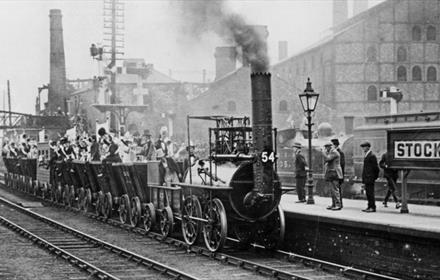 People boarding a team train